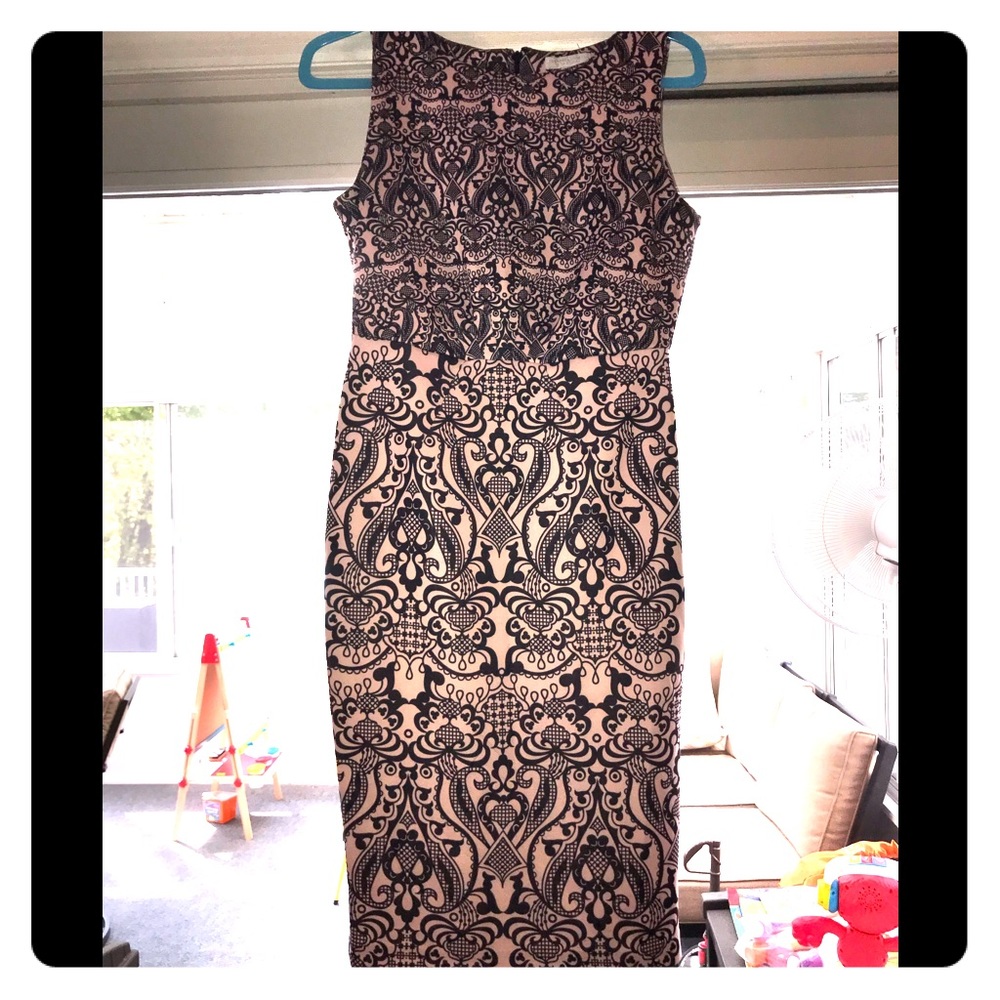 Light pink dress with navy blue pattern.